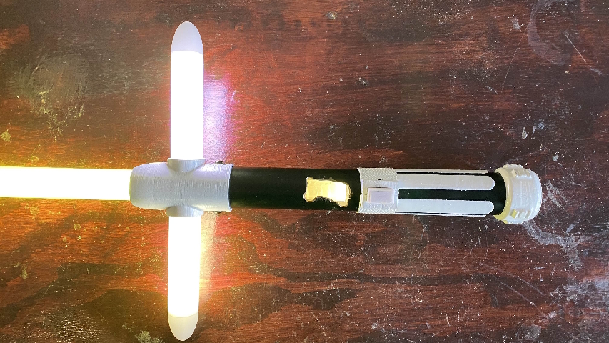 An image of my custom half wooden hilt lightsaber